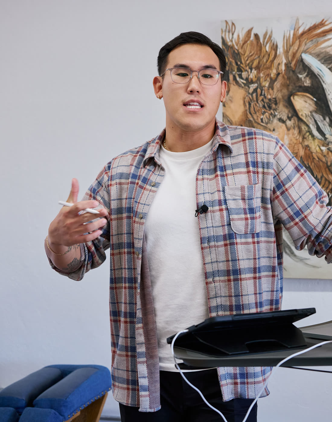 Kevin Lee, founder of MedMasters, mid-conversation at his desk